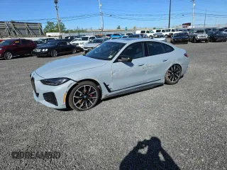 2024 BMW i4 M50 z VIN WBY33AW00RFT04066, wystawiony jako Copart lot #57458105 z przebiegiem 4754 mil mil oraz Szkody całkowita. Historia ofert i sprzedaży dostępna na DreamBid. Obrazek 1.
