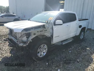 2016 GMC Canyon 4WD SLE with VIN 1GTG6CE32G1351756, listed as a Copart auction lot 61432525 with 90,558 mi miles and Salvage title. Bid and sale history available at DreamBid. Image 1.