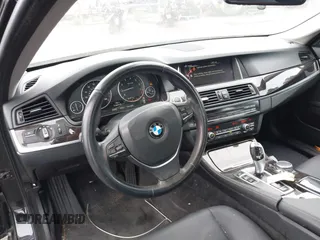 2015 BMW 5 Series 528i with VIN WBA5A5C56FD514814, listed as a IAAI auction lot 42052381 with 76,306 mi miles. Bid and sale history available at carsss.com. Image 20.