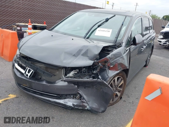 2014 Honda Odyssey Touring with VIN 5FNRL5H97EB114634, listed as a IAAI auction lot 42105220 with Not Provided miles and . Bid and sale history available at carsss.com. Image 16.