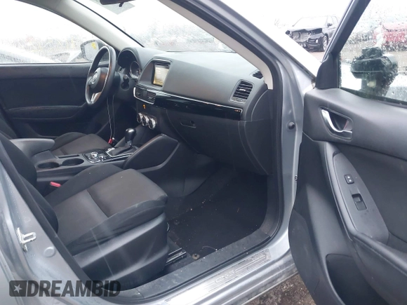 2016 Mazda CX-5 Sport with VIN JM3KE2BY5G0647715, listed as a IAAI auction lot 41831228 with 89,689 mi miles and . Bid and sale history available at DreamBid. Image 5.