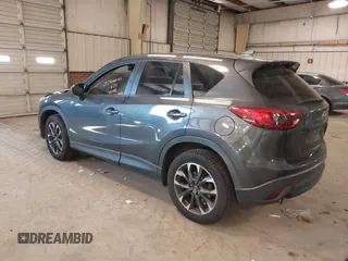 2016 Mazda CX-5 Grand Touring with VIN JM3KE2DYXG0846787, listed as a IAAI auction lot 41346364 with 113,553 mi miles. Bid and sale history available at carsss.com. Image 3.