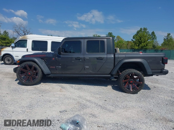 2020 Jeep Gladiator Rubicon with VIN 1C6JJTBG0LL187537, listed as a IAAI auction lot 42018914 with 53,443 mi miles and . Bid and sale history available at DreamBid. Image 15.