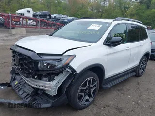 2023 Honda Passport Elite with VIN 5FNYF8H00PB022743, listed as a IAAI auction lot 42192958 with 25,165 mi miles and . Bid and sale history available at DreamBid. Image 2.
