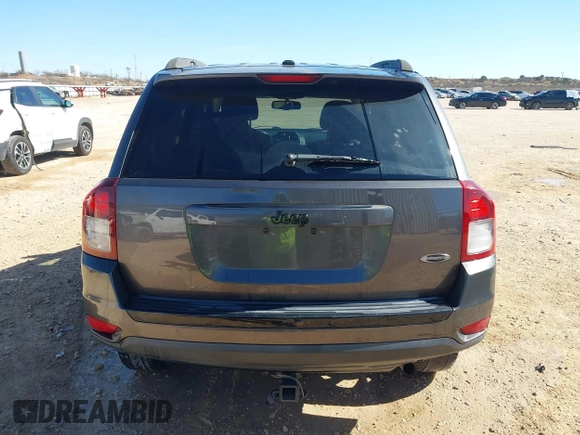 2014 Jeep Compass Sport with VIN 1C4NJCBA4ED880940, listed as a IAAI auction lot 41712357 with 156,171 mi miles. Bid and sale history available at carsss.com. Image 16.