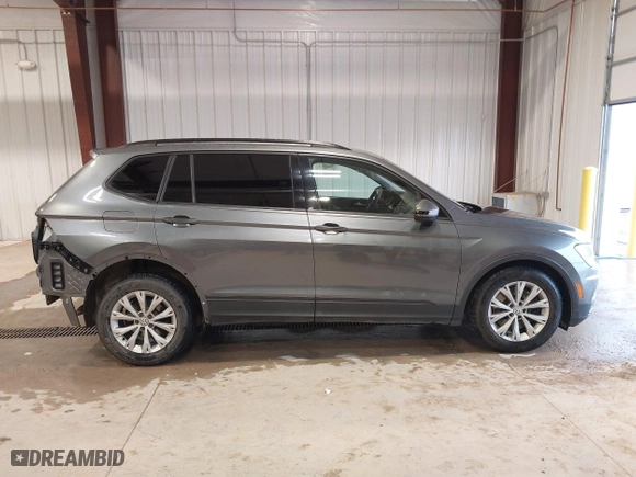 2018 Volkswagen Tiguan S with VIN 3VV1B7AX7JM106531, listed as a IAAI auction lot 41668403 with 119,885 mi miles. Bid and sale history available at carsss.com. Image 14.