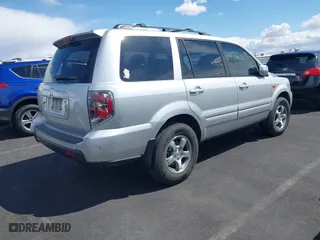 2007 Honda Pilot EX-L with VIN 5FNYF28677B005956, listed as a IAAI auction lot 41948401 with 185,599 mi miles. Bid and sale history available at carsss.com. Image 4.