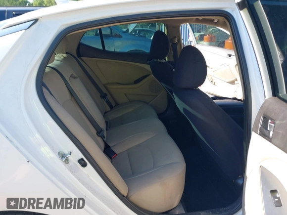 2015 Kia Optima LX with VIN 5XXGM4A70FG472650, listed as a IAAI auction lot 42698013 with 213,713 mi miles and . Bid and sale history available at DreamBid. Image 8.