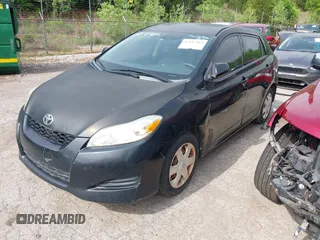 2009 Toyota Matrix with VIN 2T1KU40EX9C013986, listed as a IAAI auction lot 42117914 with 151,113 mi miles. Bid and sale history available at carsss.com. Image 2.
