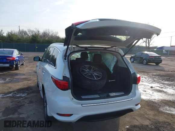 2016 Infiniti QX60 with VIN 5N1AL0MM8GC515986, listed as a IAAI auction lot 41223590 with 99,789 mi miles and . Bid and sale history available at DreamBid. Image 3.