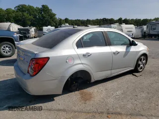 2014 Chevrolet Sonic LTZ z VIN 1G1JE5SB6E4215697, wystawiony jako Copart lot #70820024 z przebiegiem 166 414 mil mil oraz Szkoda całkowita • Salvage title. Historia ofert i sprzedaży dostępna na DreamBid. Obrazek 3.