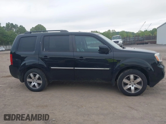 2015 Honda Pilot Touring with VIN 5FNYF4H9XFB036493, listed as a IAAI auction lot 42190624 with 223,675 mi miles and . Bid and sale history available at DreamBid. Image 13.