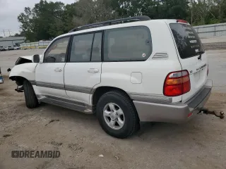 2000 Toyota Land Cruiser with VIN JT3HT05J9Y0101498, listed as a Copart auction lot 76126734 with 173,138 mi miles and Salvage Title. Bid and sale history available at carsss.com. Image 2.