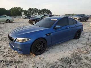2014 BMW M5 z VIN WBSFV9C52ED097296, wystawiony jako Copart lot #54181115 z przebiegiem 119 755 mil mil oraz Szkody całkowita. Historia ofert i sprzedaży dostępna na DreamBid. Obrazek 1.