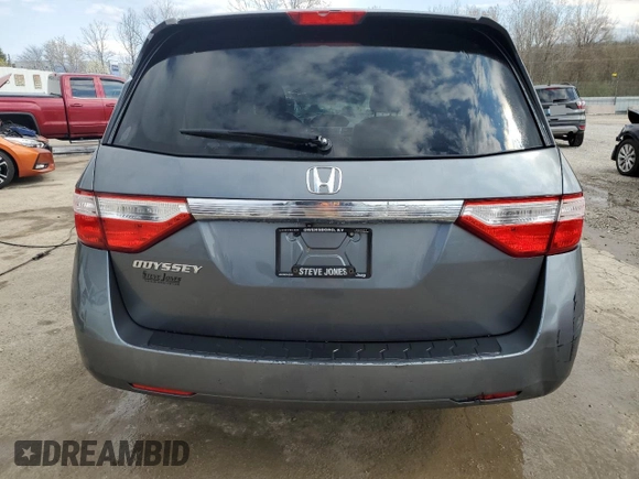 2013 Honda Odyssey EX z VIN 5FNRL5H40DB033400, wystawiony jako Copart lot #50552155 z przebiegiem 223 770 mil mil oraz Nie do naprawy. Historia ofert i sprzedaży dostępna na DreamBid. Obrazek 6.