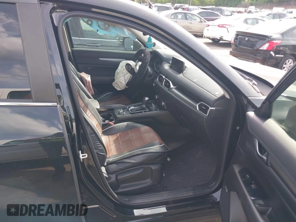 2018 Mazda CX-5 Touring z VIN JM3KFBCM9J0358997, wystawiony jako IAAI lot #42332606 z przebiegiem 93 952 mil mil oraz . Historia ofert i sprzedaży dostępna na DreamBid. Obrazek 5.
