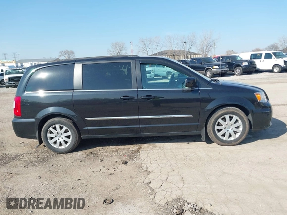 2015 Chrysler Town & Country Touring with VIN 2C4RC1BG0FR672993, listed as a IAAI auction lot 41797935 with 116,815 mi miles. Bid and sale history available at carsss.com. Image 13.