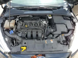 2018 Ford Focus SE z VIN 1FADP3F2XJL276652, wystawiony jako Copart lot #57499965 z przebiegiem 112 388 mil mil oraz Szkoda całkowita • Salvage title. Historia ofert i sprzedaży dostępna na DreamBid. Obrazek 11.