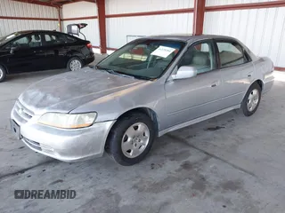 2001 Honda Accord EX z VIN 1HGCG16581A061367, wystawiony jako IAAI lot #41273264 z przebiegiem 294 003 mil mil oraz . Historia ofert i sprzedaży dostępna na DreamBid. Obrazek 2.