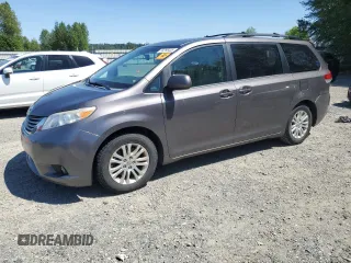 2014 Toyota Sienna XLE with VIN 5TDYK3DCXES459348, listed as a Copart auction lot 58268435 with 152,951 mi miles and Salvage title. Bid and sale history available at DreamBid. Image 1.