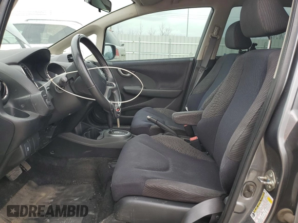 2013 Honda Fit Sport z VIN LUCGE8H70D3007465, wystawiony jako Copart lot #53542045 z przebiegiem 223 335 mil mil oraz Szkoda całkowita • Salvage title. Historia ofert i sprzedaży dostępna na DreamBid. Obrazek 7.