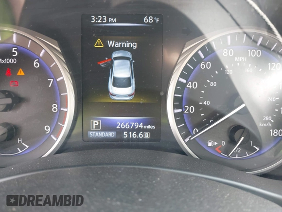 2015 Infiniti Q50 Premium with VIN JN1BV7AP0FM342504, listed as a IAAI auction lot 42127971 with 266,794 mi miles. Bid and sale history available at carsss.com. Image 7.