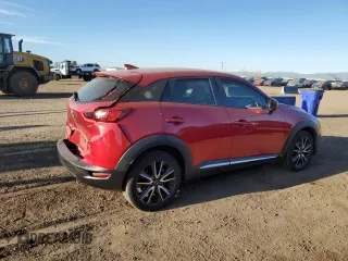 2018 Mazda CX-3 Grand Touring z VIN JM1DKFD79J0313779, wystawiony jako Copart lot #49120125 z przebiegiem 40 703 mil mil oraz Szkody całkowita. Historia ofert i sprzedaży dostępna na DreamBid. Obrazek 3.