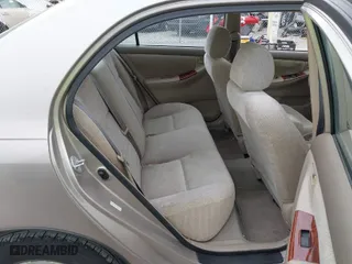 2003 Toyota Corolla CE with VIN 1NXBR32E73Z137535, listed as a IAAI auction lot 42041727 with 243,586 mi miles. Bid and sale history available at carsss.com. Image 8.