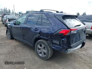 2023 Toyota RAV4 XLE with VIN JTMP1RFV1PD095688, listed as a IAAI auction lot 41874720 with 59,737 mi miles. Bid and sale history available at carsss.com. Image 3.