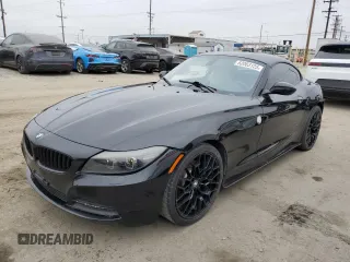 2012 BMW Z4 sDrive28i with VIN WBALL5C56CE716558, listed as a Copart auction lot 62003125 with 93,438 mi miles and Salvage title. Bid and sale history available at DreamBid. Image 1.