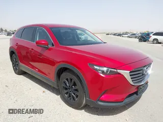 2016 Mazda CX-9 Touring z VIN JM3TCACY9G0102524, wystawiony jako IAAI lot #42305452 z przebiegiem 76 892 mil mil oraz . Historia ofert i sprzedaży dostępna na DreamBid. Obrazek 6.