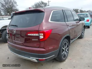 2019 Honda Pilot Touring 8-Passenger with VIN 5FNYF5H95KB009122, listed as a IAAI auction lot 41573338 with 85,845 mi miles. Bid and sale history available at carsss.com. Image 4.