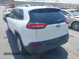 2015 Jeep Cherokee Latitude with VIN 1C4PJLCB7FW790865, listed as a IAAI auction lot 42182034 with 161,642 mi miles and . Bid and sale history available at carsss.com. Image 3.
