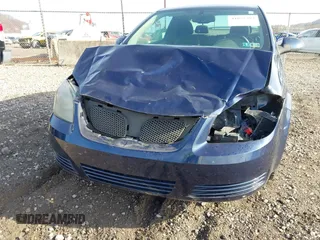2009 Pontiac G5 with VIN 1G2AS18H797276991, listed as a IAAI auction lot 41855397 with 131,376 mi miles. Bid and sale history available at carsss.com. Image 6.