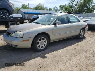 2003 Mercury Sable GS z VIN 1MEFM50U43G625185, wystawiony jako Copart lot #54238235 z przebiegiem 208 900 mil mil oraz Szkody całkowita. Historia ofert i sprzedaży dostępna na DreamBid. Obrazek 1.