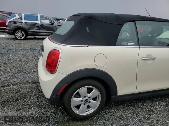 2019 MINI Convertible Cooper z VIN WMWWG5C54K3F79764, wystawiony jako Copart lot #48692085 z przebiegiem 94 211 mil mil oraz Szkoda całkowita • Salvage title. Historia ofert i sprzedaży dostępna na DreamBid. Obrazek 13.