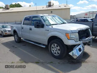 2012 Ford F-150 XL with VIN 1FTFW1ETXCKD97663, listed as a IAAI auction lot 41934420 with 147,471 mi miles. Bid and sale history available at carsss.com. Image 1.