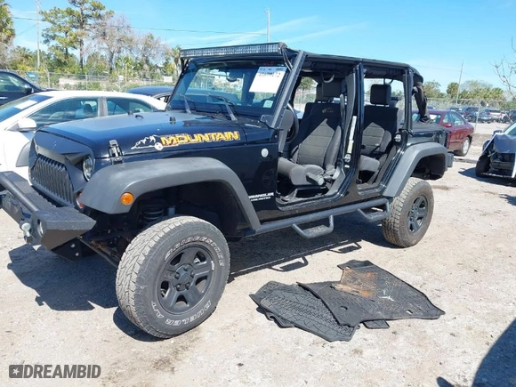 2010 Jeep Wrangler Unlimited Sport with VIN 1J4BA3H19AL229369, listed as a IAAI auction lot 41699172 with 125,021 mi miles. Bid and sale history available at carsss.com. Image 2.