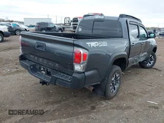 2021 Toyota Tacoma 4WD SR with VIN 3TMCZ5AN2MM406293, listed as a IAAI auction lot 41925585 with 52,243 mi miles. Bid and sale history available at carsss.com. Image 4.