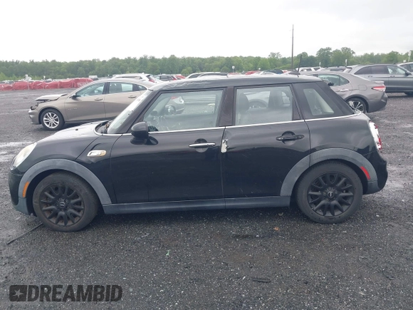 2015 MINI Hardtop 4 Door S with VIN WMWXU3C55F2B56429, listed as a IAAI auction lot 42335996 with 114,781 mi miles and . Bid and sale history available at DreamBid. Image 15.