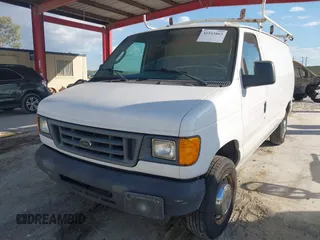 2005 Ford Econoline Cargo with VIN 1FTNE24L35HA46731, listed as a IAAI auction lot 41543863 with 179,541 mi miles. Bid and sale history available at carsss.com. Image 2.