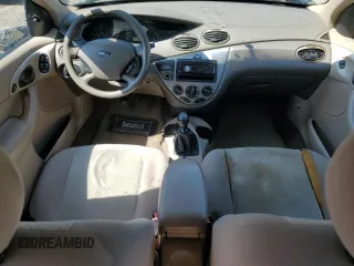 2004 Ford Focus ZTW with VIN 1FAFP35Z84W203676, listed as a Copart auction lot 57272835 with 183,115 mi miles and Salvage title. Bid and sale history available at DreamBid. Image 8.