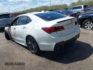2018 Acura TLX w/A-SPEC Pkg with VIN 19UUB2F63JA013342, listed as a IAAI auction lot 42051724 with 43,396 mi miles and . Bid and sale history available at DreamBid. Image 3.