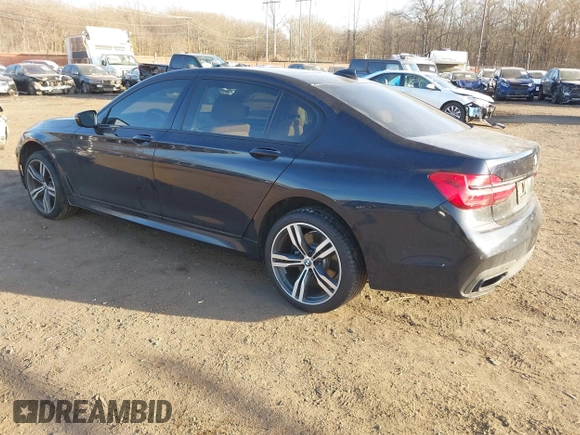 2017 BMW 7 Series 750i with VIN WBA7F0C34HGM21805, listed as a IAAI auction lot 41446797 with 88,753 mi miles and . Bid and sale history available at DreamBid. Image 3.