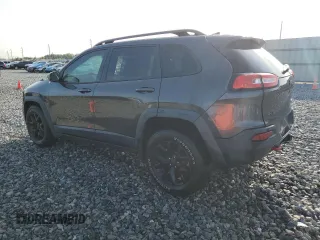 2016 Jeep Cherokee Trailhawk with VIN 1C4PJMBS4GW188840, listed as a Copart auction lot 58760605 with 117,570 mi miles and Salvage title. Bid and sale history available at DreamBid. Image 2.