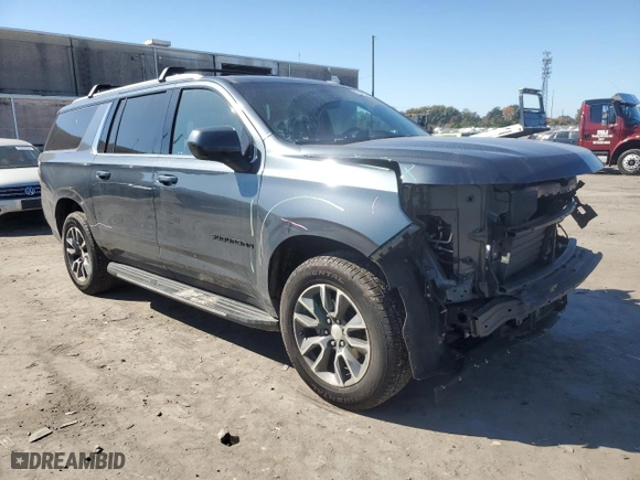 2021 Chevrolet Suburban LT with VIN 1GNSKCKD4MR482940, listed as a Copart auction lot 77072314 with 61,739 mi miles and Salvage Title. Bid and sale history available at carsss.com. Image 4.
