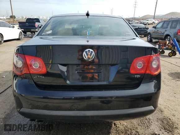 2006 Volkswagen Jetta 1.9L TDI z VIN 3VWST81KX6M746490, wystawiony jako Copart lot #58409565 z przebiegiem 229 433 mil mil oraz Szkoda całkowita • Salvage title. Historia ofert i sprzedaży dostępna na DreamBid. Obrazek 6.