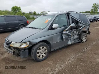 2002 Honda Odyssey EX z VIN 2HKRL18642H527347, wystawiony jako Copart lot #58602465 z przebiegiem 117 587 mil mil oraz Szkoda całkowita • Salvage title. Historia ofert i sprzedaży dostępna na DreamBid. Obrazek 1.