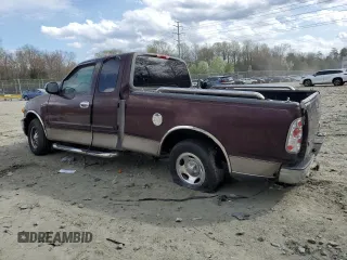 2001 Ford F-150 XL with VIN 1FTZX17211NA94099, listed as a Copart auction lot 50587055 with Not provided miles and Salvage title. Bid and sale history available at DreamBid. Image 2.