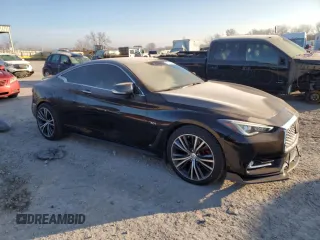 2019 Infiniti Q60 Luxe with VIN JN1EV7EL2KM290162, listed as a Copart auction lot 87421264 with 64,537 mi miles and Salvage title. Bid and sale history available at DreamBid. Image 4.